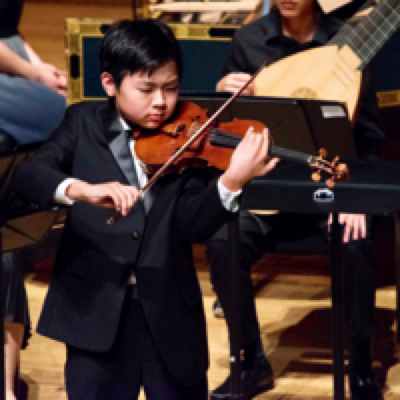 Kevin Miura playing the violin